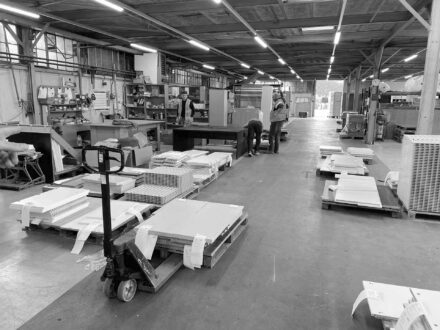 members of the team assembling an office desk